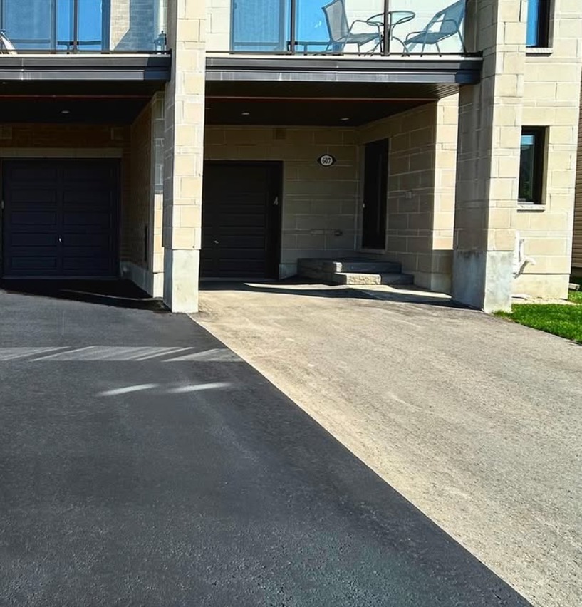 Half-sealed driveway showing the Seal Bros process