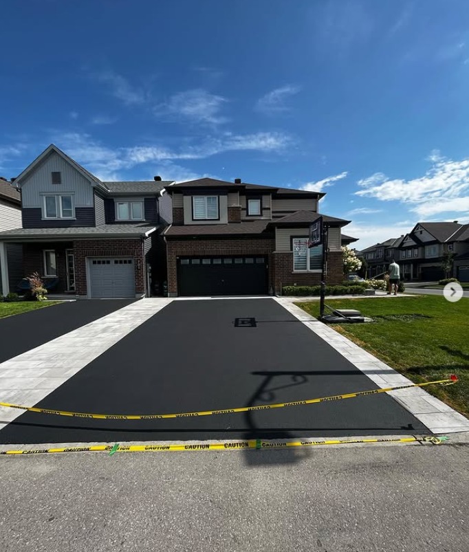Freshly sealed driveway by Seal Bros